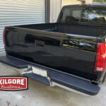 Tailgate with step bumper